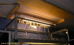 Now the tank has been put in place, but there is lacking light shielding in the sides and a cabinet door.