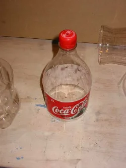 A precise hole must also be drilled in the bottle cap for the hose.